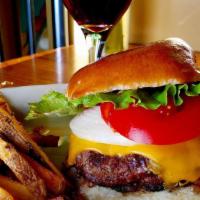 Moon Burger · grilled ½ pound sirloin with cheese: American, Swiss, Merkts Cheddar, pepperjack or mozzarella