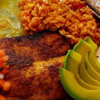 Fish Tacos · Cilantro, pico de gallo, avocado, Mexican rice, lime crema, corn tortillas