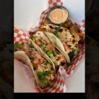 Street Tacos · 3 pieces. Three flour tortillas stuffed with grilled chicken, Jalapeno Cream Cheese, lettuce...