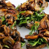 Plt Tartine · Smokey portobello mushroom (bacon flavor marinade), lettuce, tomato, veganaise on sprouted g...
