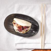 1 Piece Jinya Bun Plate · Steamed bun stuffed with slow-braised pork chashu, cucumber and baby mixed greens served wit...