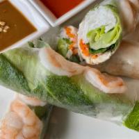 Spring Rolls · Fresh shrimp with thinly-sliced pork belly, lettuce, mint, pickled daikon, and carrots, hand...