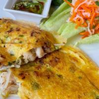 Vietnamese Crepes · Fresh shrimp and pork belly, mixed with sprouts and scallion, pan-seared in an egg batter. S...