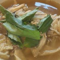 Chicken Pho · Slow-roasted chicken with white onion, green onion, and basil, over rice noodles in our savo...