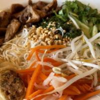 Vermicelli Vietnamese Noodles · Rice noodles plated with lettuce, mint, pickled cucumber, daikon, and carrots, sprouts serve...
