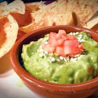 Guacamole And Chips · Served with crispy corn tortilla chips