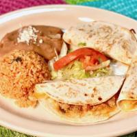 Three Quesadillas · Three soft flour tortillas filled with melted chihuahua cheese and choice of filling. Served...