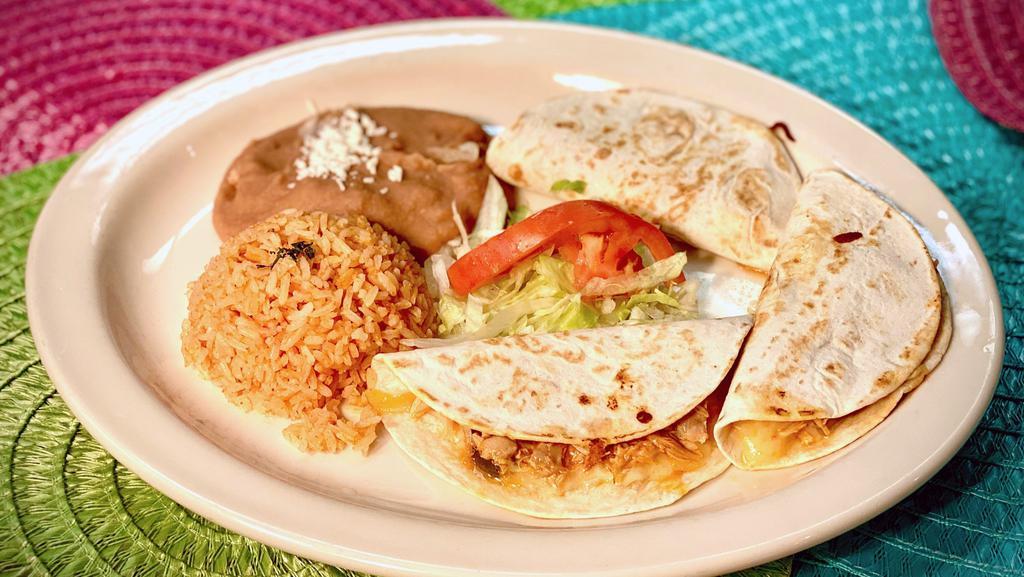 Three Quesadillas · Three soft flour tortillas filled with melted chihuahua cheese and choice of filling. Served with Spanish rice and refried beans.