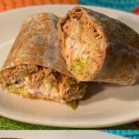 Chicken Burrito · Includes a spread of refried beans, lettuce, tomato, cheese, and sour cream.