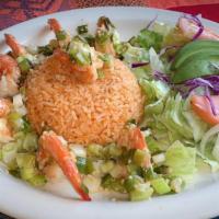 Camarones Al Mojo De Ajo · Eight grilled shelled jumbo shrimp tossed with green onions in a garlic butter sauce. Served...