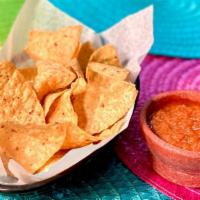 Chips 'N Salsa · 8oz of our House red Salsa & chips