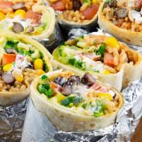 Burrito · Flour tortilla filled with rice, beans, lettuce, cilantro, onion, cheese, sour cream, corn, ...