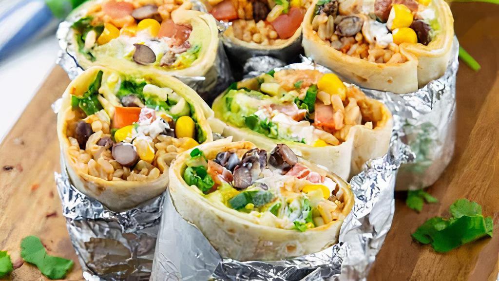 Burrito · 12’’ Flour tortilla shell stuffed with rice, your choice of beans and one of our house meats. Topped with lettuce, sour cream, cheese, onions, cilantro, corn and your choice of salsa.
