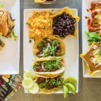 Maya Plate Tacos · Three tacos served with rice and your choice of beans. Choose your favorite house meat. All ...
