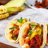 4 Taco Combo · Four tacos filled with your choice of our house meats and topped with cilantro and onions. I...