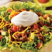 Vegetarian Taco Salad · Fried flour tortilla shell stuffed with lettuce at the bottom, rice, your choice of beans, s...