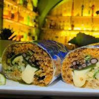 Maya Burrito · 12’’ Flour tortilla shell stuffed with rice, your choice of beans and roasted poblano pepper...