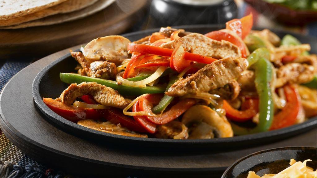 Fajitas · Onions, green and red peppers cook with your favorite protein. Served with a side of rice, beans and tortillas.