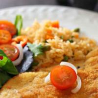 Ensalada Con Milanesa · Breaded chicken breast served over fresh chopped lettuce, and tomatoes. Served with a side o...
