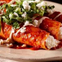 Vegetarian Enchiladas · Four soft rolled corn tortillas filled with cheese and covered with your choice of homemade ...