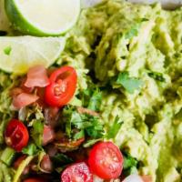 Guacamole (4Oz) · Ripe avocados, squirt of lime, onions, jalapeños, cilantro, chopped tomatoes and salt.