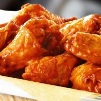 Traditional Wings Only · Seasoned to perfection with over 4 sauce and dipping sauce options.