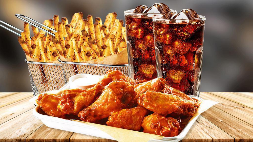 Traditional Wings Party Platter Combo · 20 wings served with two basket fries and 2 drinks. Seasoned to perfection, handspun wings with over 4 sauce and dipping sauce options.