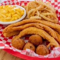 Fried Catfish · Two catfish filets, hand battered and fried served with four hush puppies.