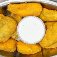 Jalapeno Poppers · Stuffed with cheddar cheese and breaded. Served with cooling ranch or blue cheese dressing