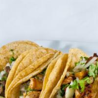 Tacos · comes w/onion &cilantro