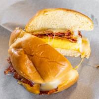 Bacon Breakfast Sandwich · Bacon (Hickory Smoked), Seasoned Egg, Mozzarella and Cheddar Cheese Blend served on a Brioch...