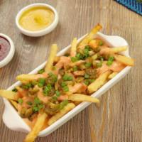 Small Nacho Fiesta Fries · Try these delicious nacho fries topped with a sharp cheddar cheese and finished off with jal...