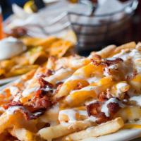 Large Cheese Cleopatra'S Fries · Our signature fries are topped with sharp cheddar cheese and are a delicious option for the ...