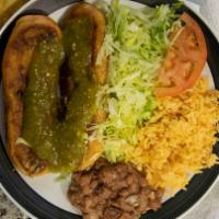 2 Chile Rellenos · Served with rice, beans and small salad.
