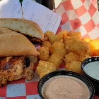 Cajun Chicken Sandwich · A large grilled chicken breast seasoned with Jones’ special cajun seasoning and served on a ...