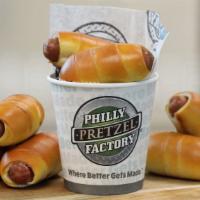 Mini Dogs Cup · 4 bite-size, all beef mini pretzel dogs with american cheese.