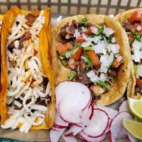 Tacos Con Tortilla De Harina · It can be steak, chicken, al pastor, chorizo and much more.