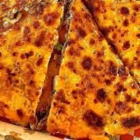 Pizzabirria  · 12”  Pizza stuffed with lots of our delicious birria, list of mozzarella cheese and cilantro...