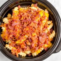 Specialty Fries - Bacon Cheese (Large) · LARGE order of Bacon Nacho Cheese Fries
** Contains Cheese / Dairy **