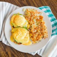 Avocado Benedict · Poached eggs, toasted English muffin, avocado, tomatoes, spinach, hollandaise sauce and hash...