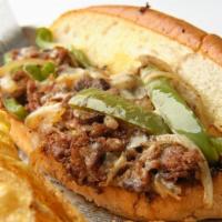 Cheese Steak Sandwich · Grilled ribeye steak, provolone cheese, green peppers, onions & mushrooms, baked on ciabatta...