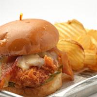 Crispy Chicken Club · Grilled or fried chicken breast, tossed in your choice of sauce and topped with thick cut ba...
