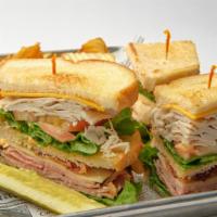 The Den Club · Bavarian ham, roasted turkey, lettuce, tomatoes, thick cut bacon, swiss cheese, American che...