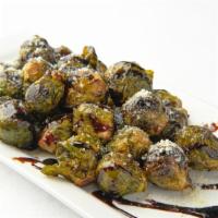 Brussel Sprouts · Roasted Brussel sprouts, topped with Dijon glaze & parmesan cheese.