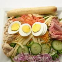 Maurice Salad · Mixed greens, Bavarian ham, turkey, egg, tomatoes, red onion, cheddar cheese, swiss cheese s...
