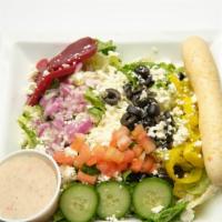Greek · Mixed greens, feta cheese, banana peppers, beets, black olives, tomatoes, cucumbers, red oni...