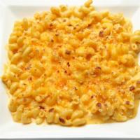 Mac And Cheese · In-house made with our blue moon beer cheese topped with shredded cheddar and breadcrumbs.