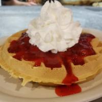 Strawberry Waffle · A Belgian waffle topped with strawberry compote.