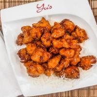 Sesame Chicken · Chicken chunks deep fried in a light batter and then covered with sesame seeds.