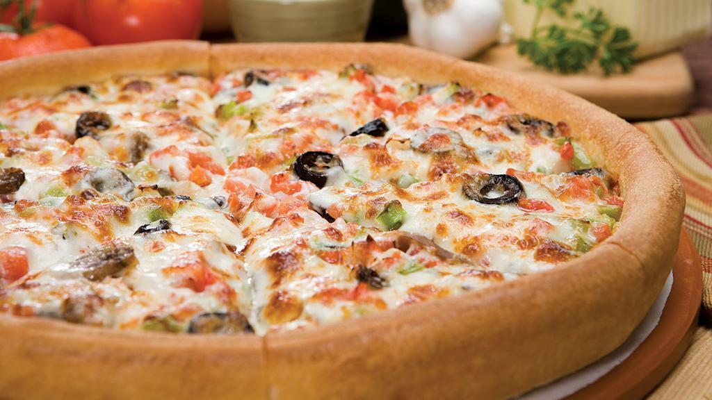 Veggie - Large · Made especially for veggie lovers. Diced onion, crisp green peppers, black olives, fresh tomatoes, tender mushrooms and mozzarella cheese.   200-280cal per slice